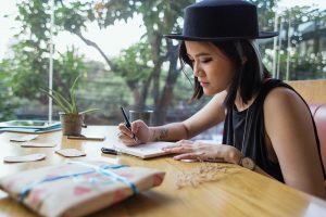 Writing and drawing outside | The Livingstone Apartments | 1 & 2 Bedroom Apartments in West Seattle | Seattle, WA 98106
